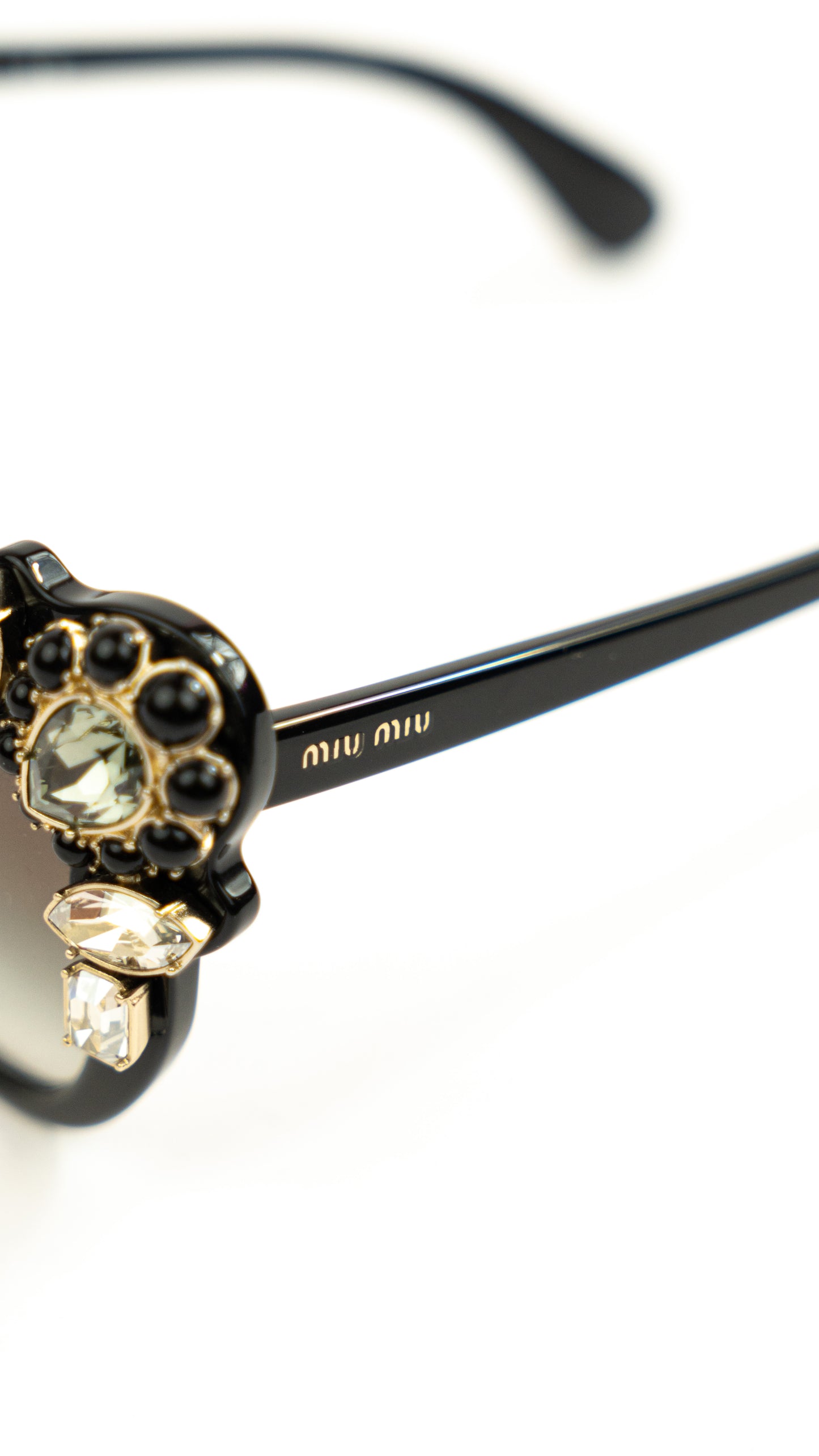 Miu Miu sunglasses con piedras