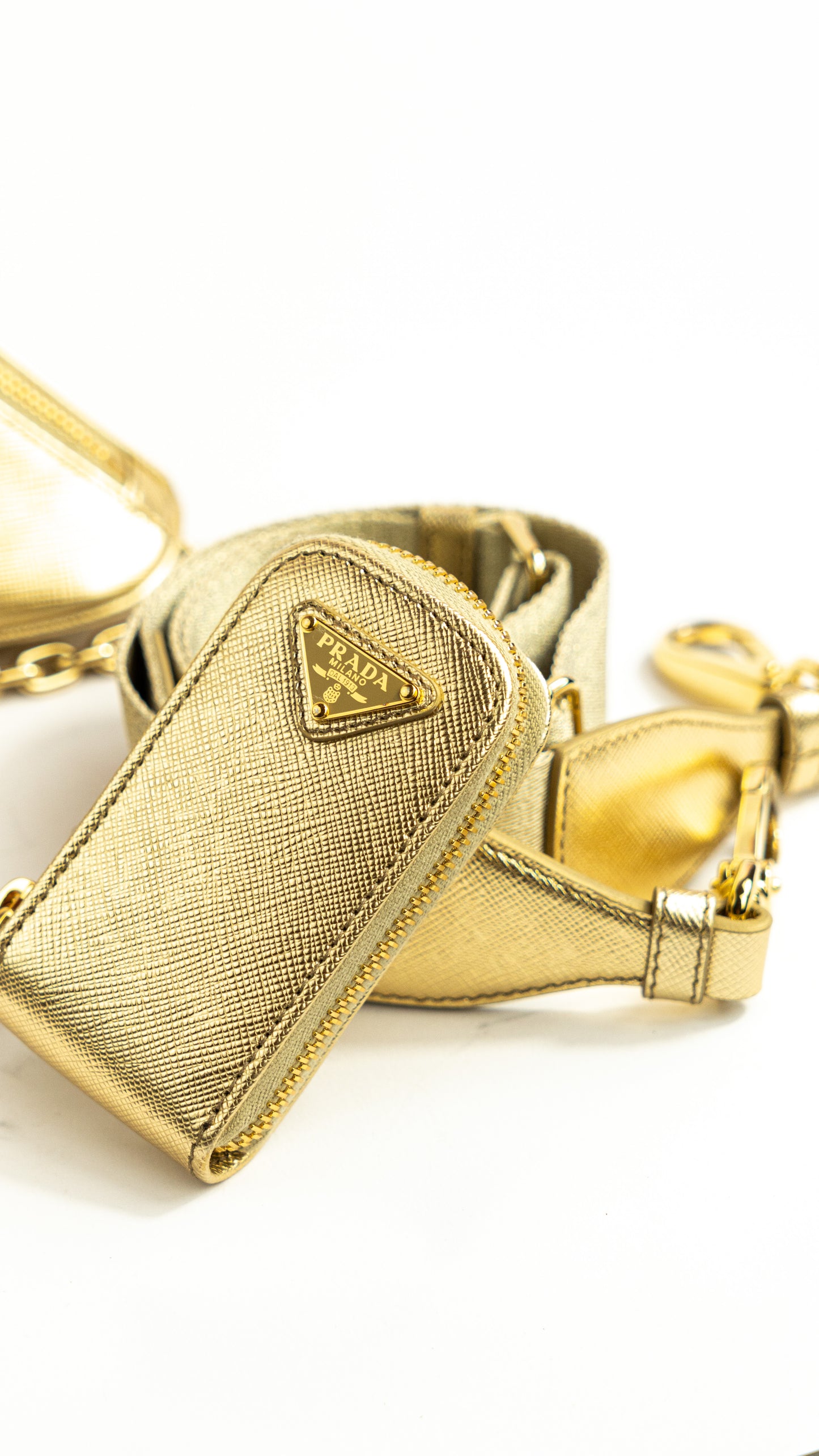 Prada triangle Gold bag